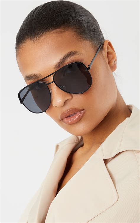 oversized black aviator sunglasses.